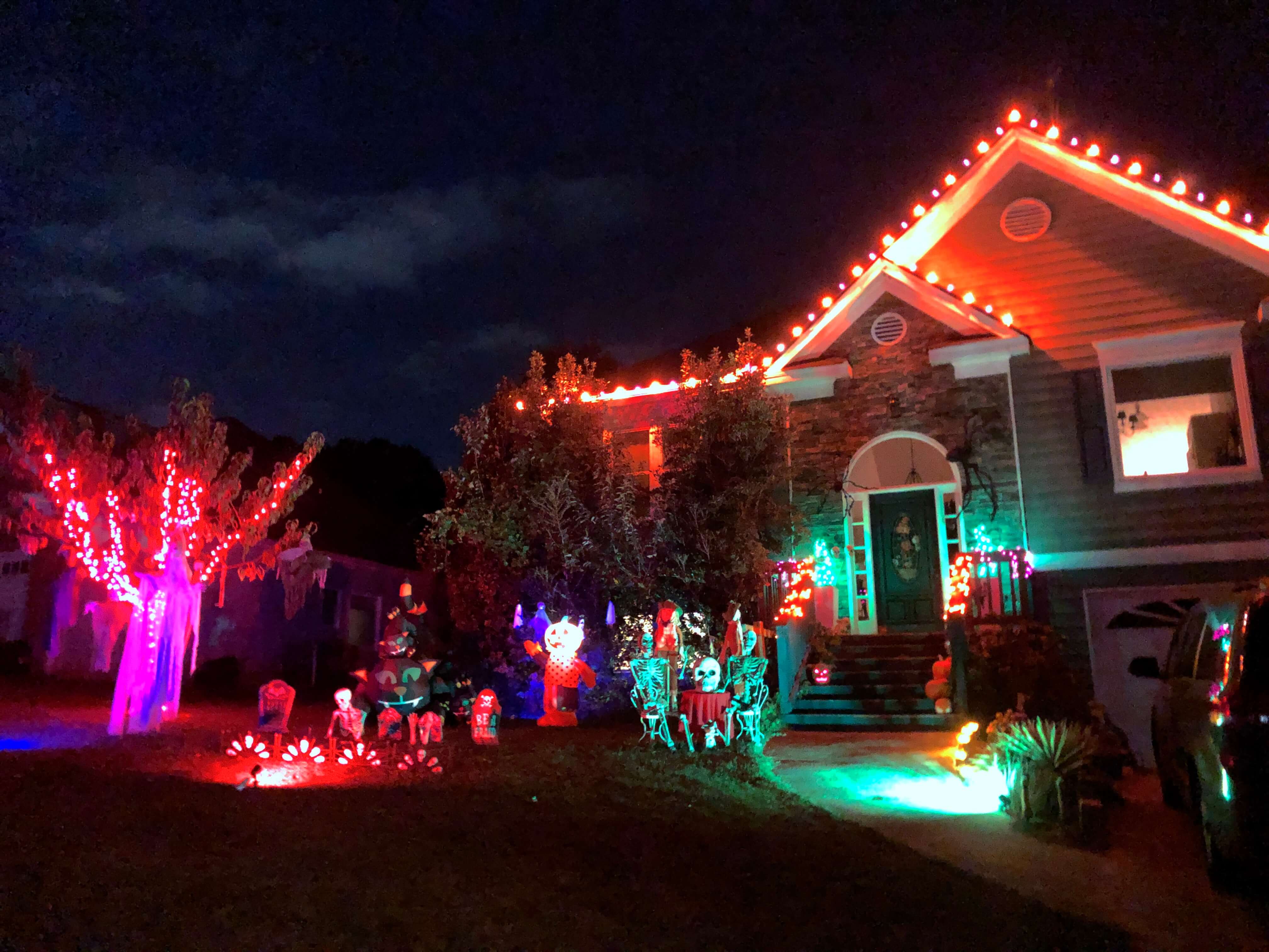 Purple and orange themed Halloween decorative lighting in Woodstock GA