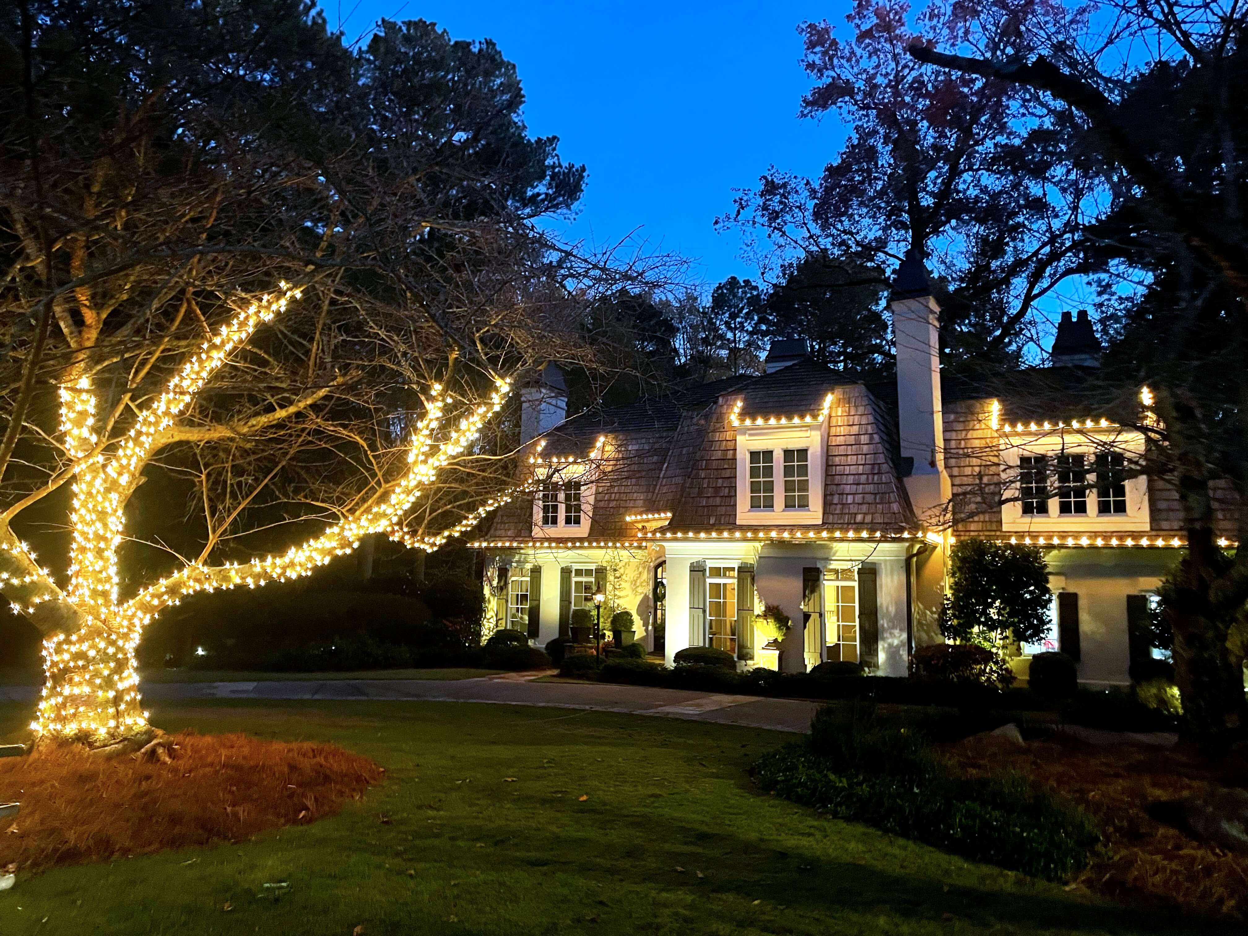 Full house holiday light installation by stunt professionals in Alpharetta